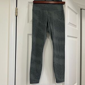 Athleta Transcend star pattern leggings in size S